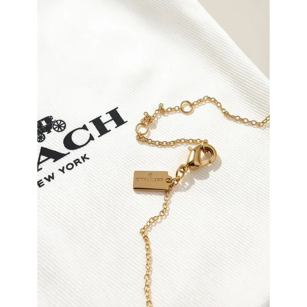 Coach Signature C Coin Pendant Necklace